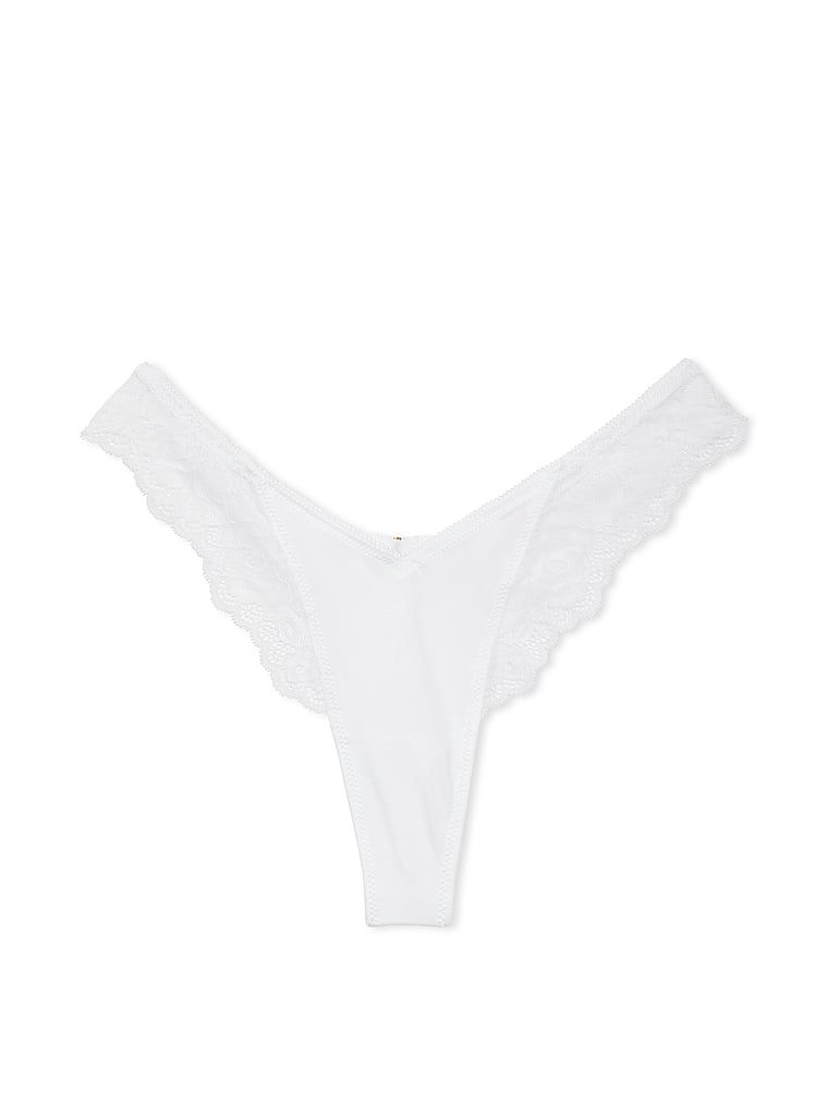 Tanga cu dantelă cu picior înalt. Produsul este alb și provine din colecția Very Sexy.