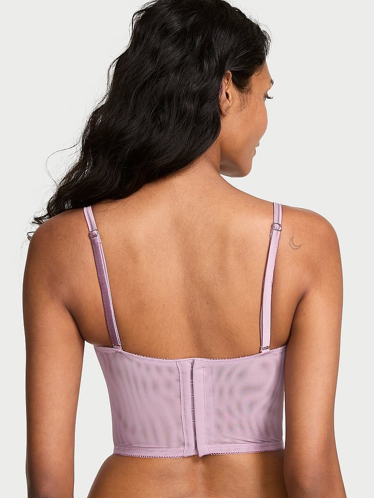 Topul corset Atelier Ethereal. Produsul este roz și provine din colecția Dream Angels.