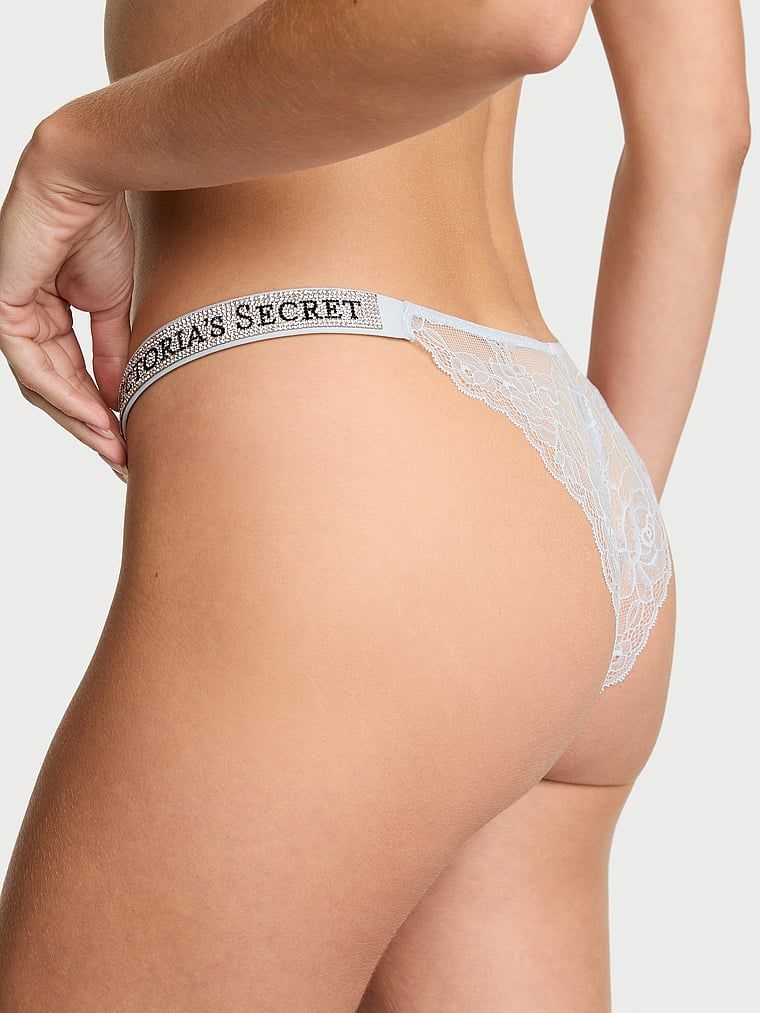 Chiloți brazilieni din dantelă cu dungi braziliene Shine Strap. Produsul este albastru și provine din colecția Very Sexy.
