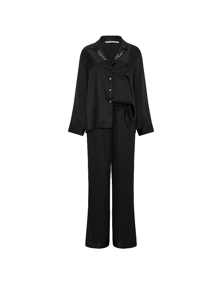 Pijamale din satin semnătură cu mâneci lungi. Produsul este negru și provine din colecția Victoria's Secret.