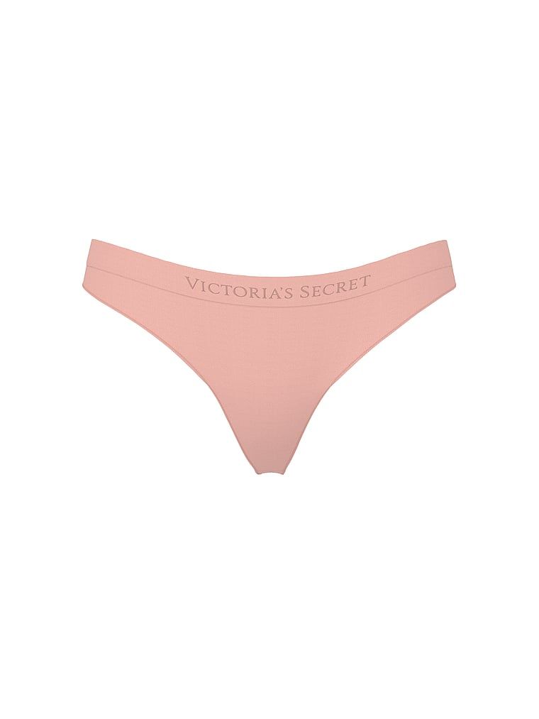 Tanga fără cusături Shine. Produsul este de culoare roz și provine din colecția Seamless