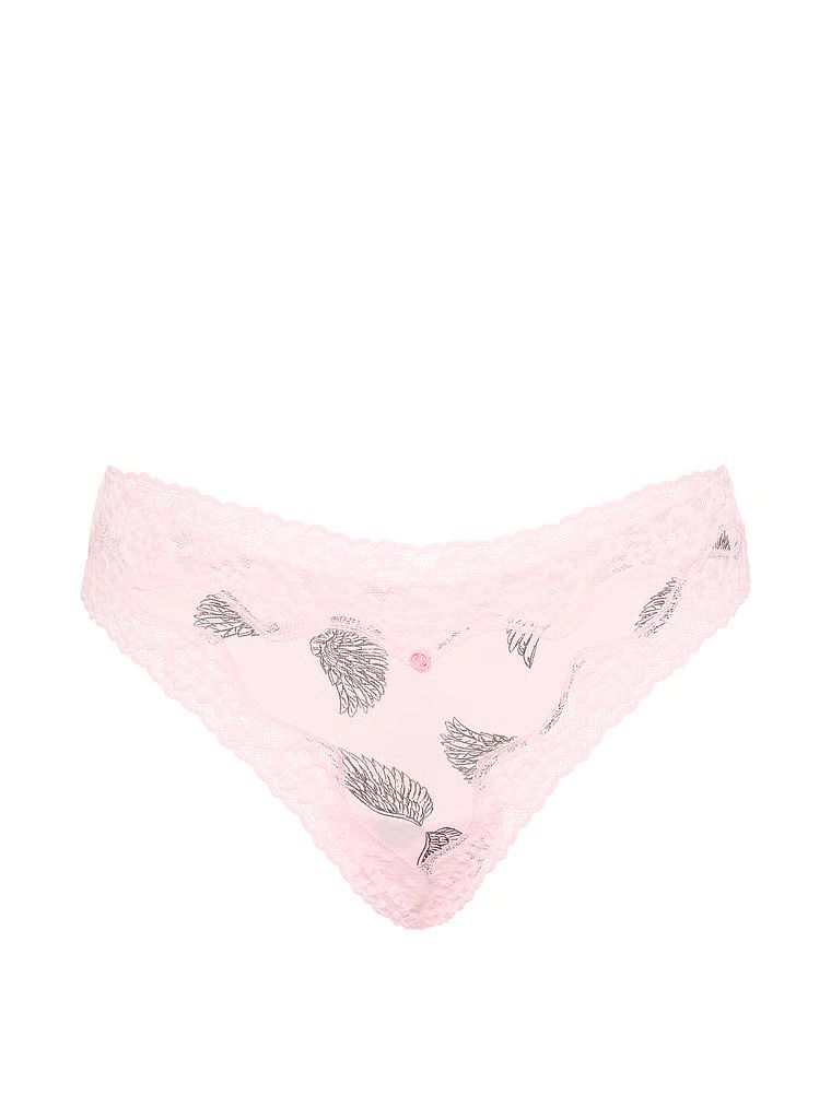 Tanga de bumbac cu dantelă - Lace-Trim. Produsul are o culoare cu model și provine din colecția Lace Trim.
