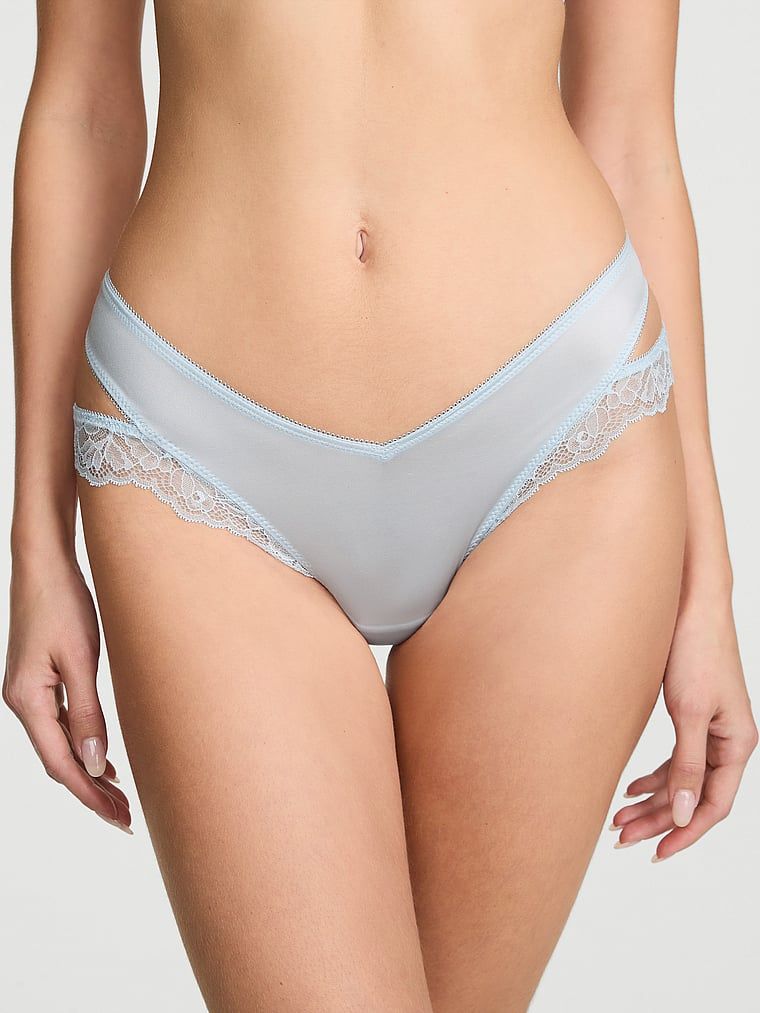 Tanga cu dantelă și decupaje pe laterale. Produsul este de culoare albastră și provine din colecția Very Sexy.