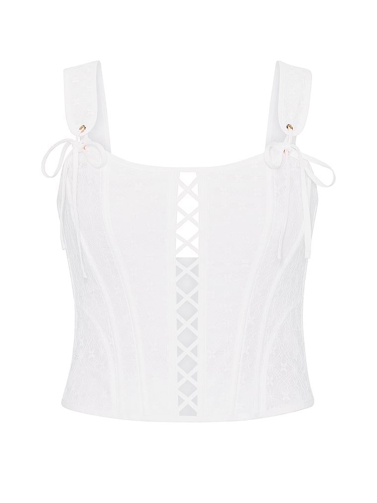 Topul de corset făcut din bumbac și dantelă. Produsul este alb și provine din colecția Dream Angels.