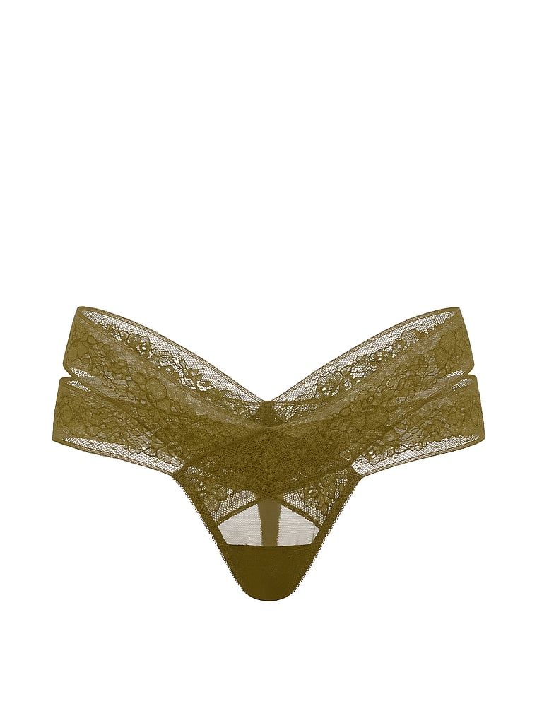 Tanga cu decupaje și dantelă cu bretele. Produsul este de culoare verde și provine din colecția Very Sexy.