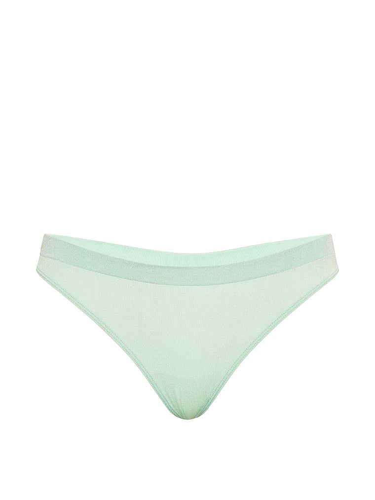 Tanga din material strălucitor de Shimmer. Produsul este de culoare verde și provine din colecția Seamless (Seamless Collection).
