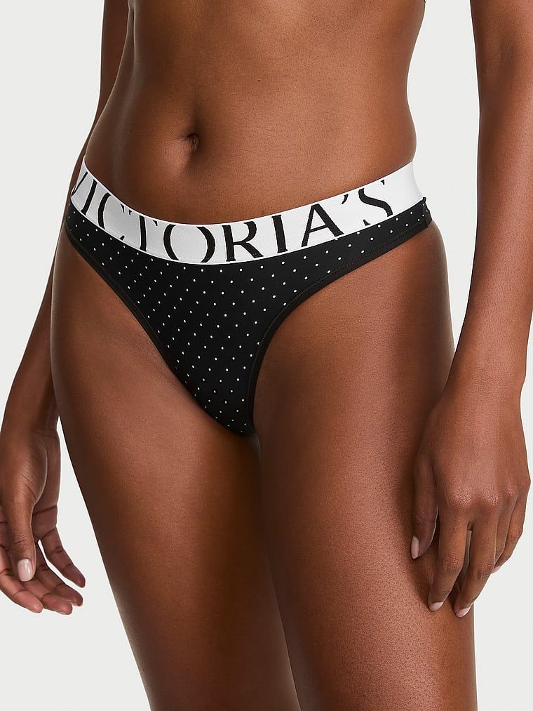 Tanga cu logo-ul Cool. Produsul are o culoare cu model și provine din colecția Bumbac.