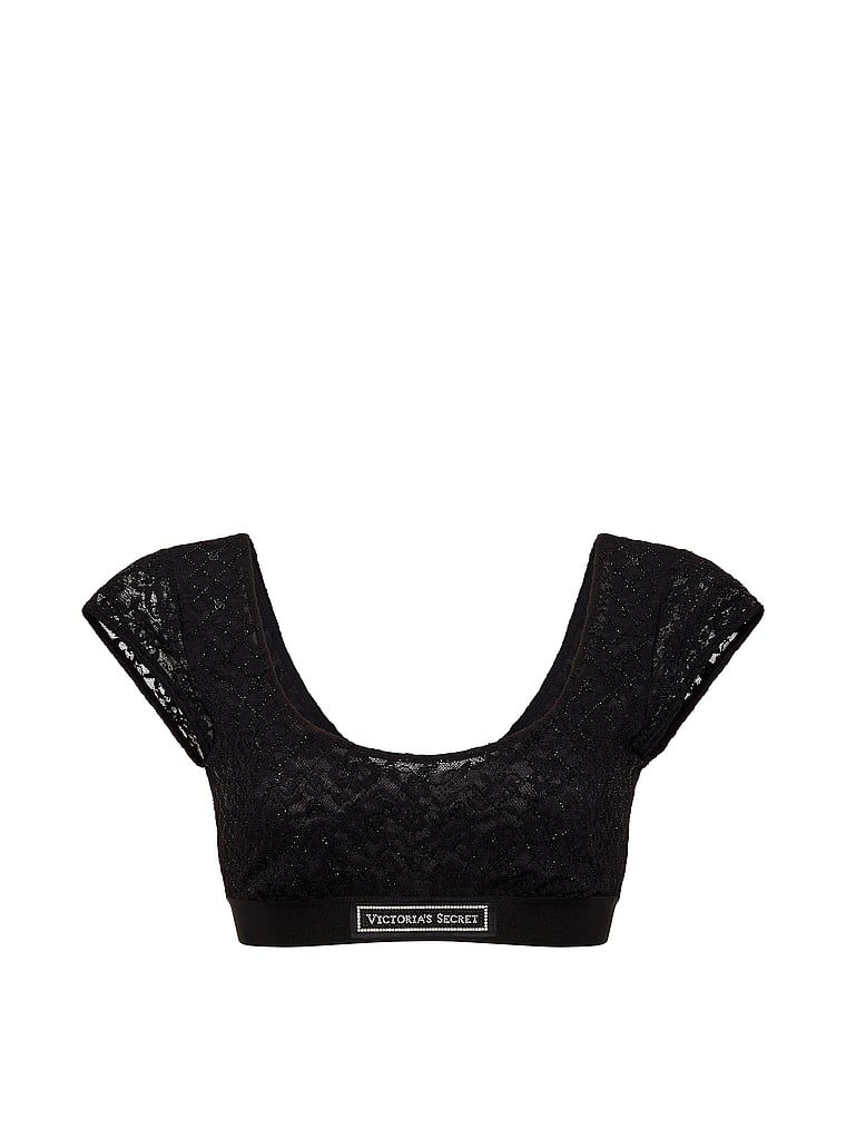 Sutiene bralet din dantelă cu mâneci și logo-ul Shine. Produsul este negru și provine din colecția de tricouri.