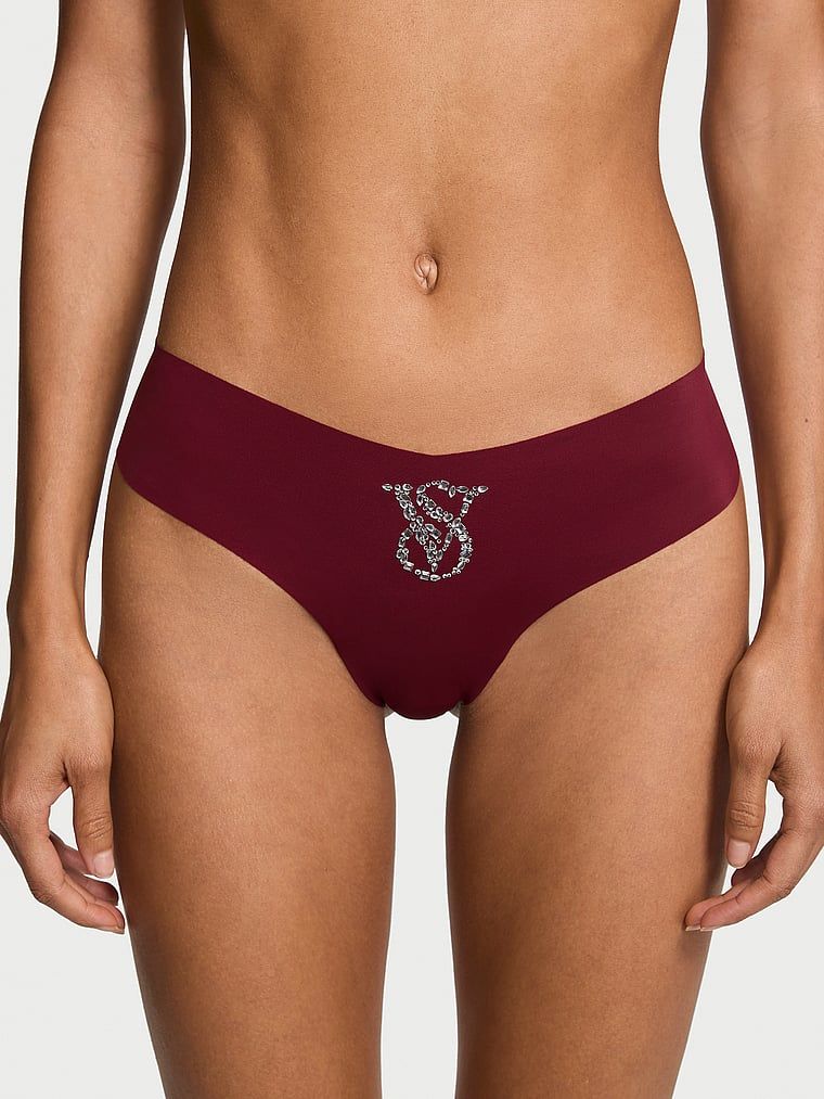 Tanga fără sudură fără prezentare. Produsul este de culoare roșie și provine din colecția No-Show.