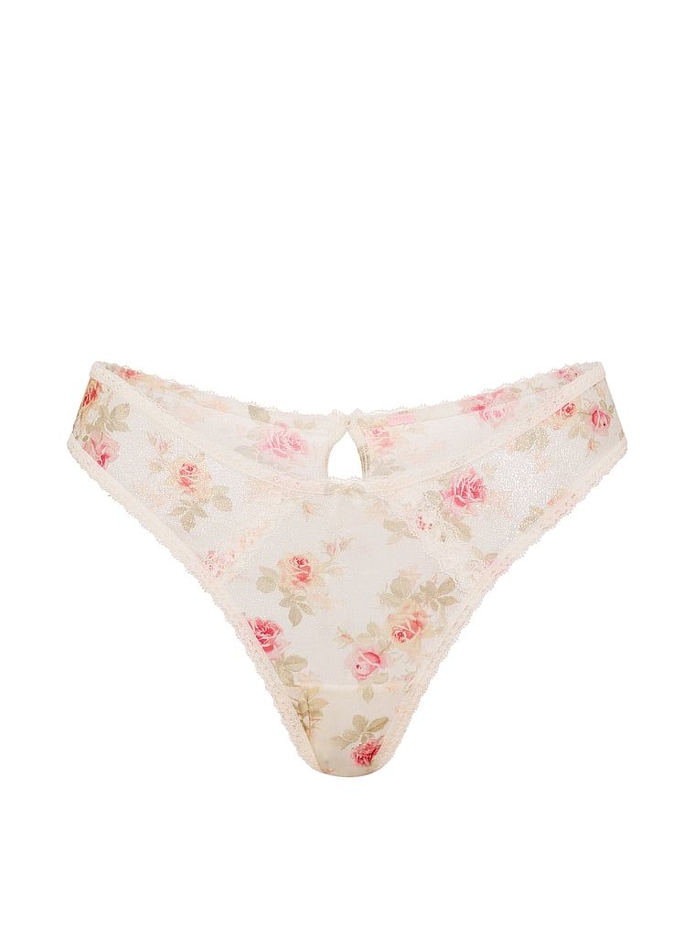 Chiloți brazilieni strălucitori cu decupaje în spate Sheer Shimmer Brazilian. Produsul are o culoare florală și provine din colecția Dream Angels.
