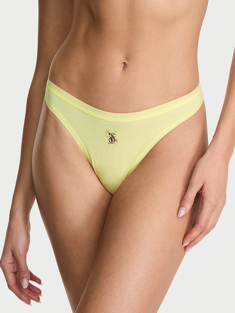 Tanga de bumbac cu picior înalt. Produsul este galben și provine din colecția Victoria's Secret.
