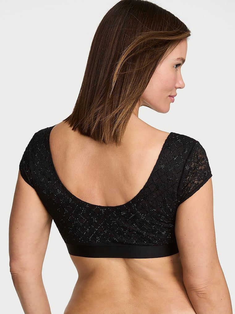 Sutiene bralet din dantelă cu mâneci și logo-ul Shine. Produsul este negru și provine din colecția de tricouri.