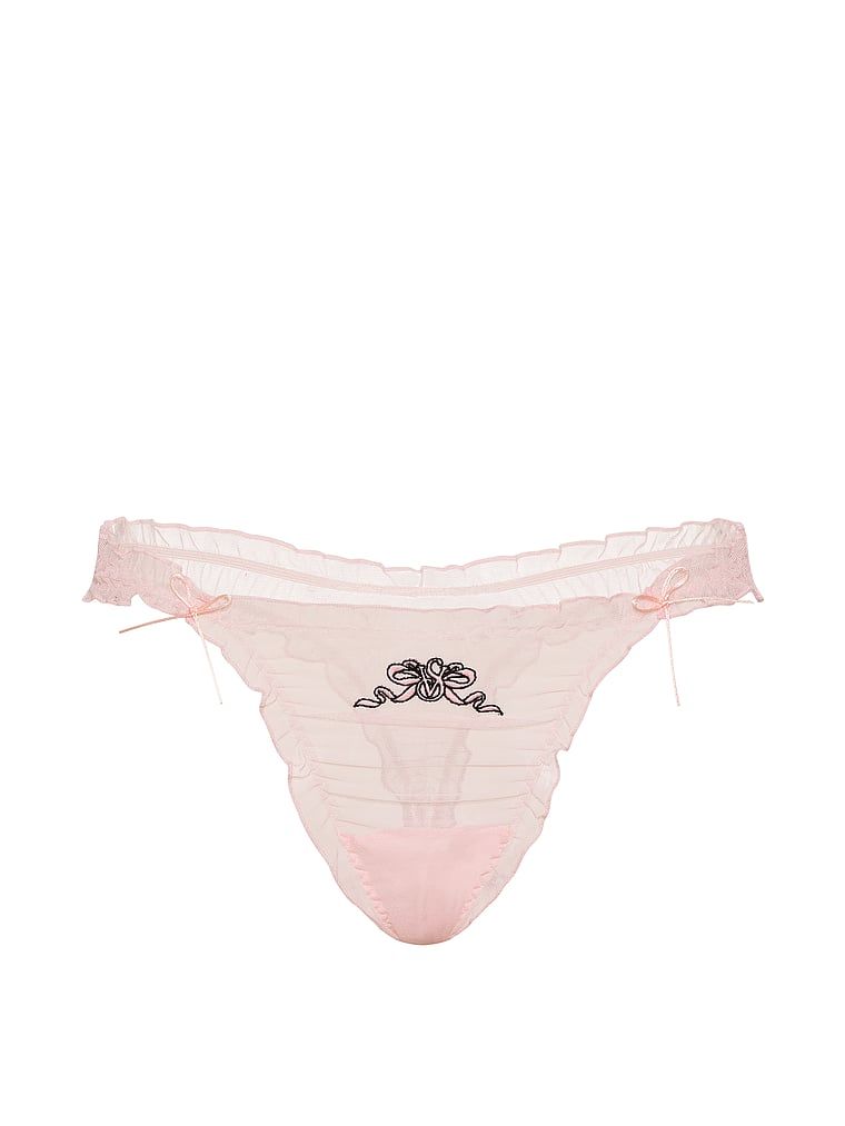 Tanga cu volane, fundițe din plasă cu volane. Produsul este roz și provine din colecția Dream Angels.