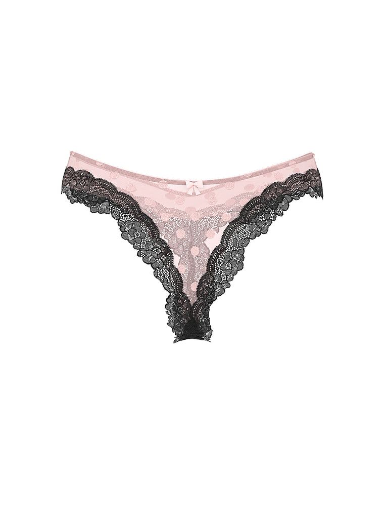 Tanga Tease Sheer Dot din plasă înaltă cu picioare înalte. Produsul este modelat și provine din colecția Victoria's Secret.