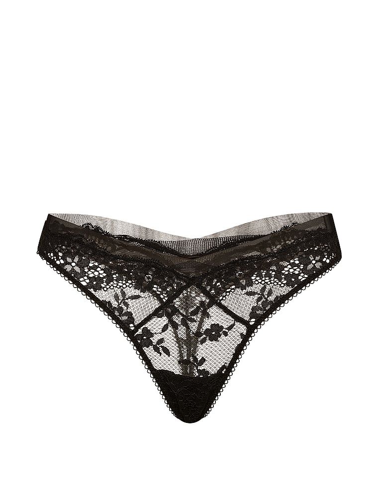 Tanga din dantelă și plasă. Produsul este negru și provine din colecția Dream Angels.