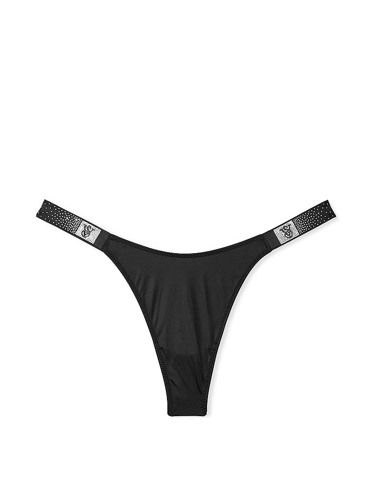 Tanga cu bretele strălucitoare Scattered Shine. Produsul este negru și provine din colecția Very Sexy.