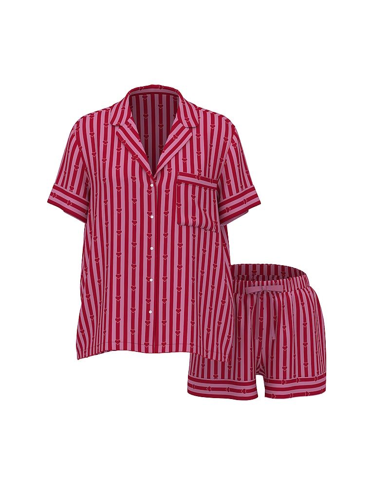 Pijamale de satin cu pantaloni scurți semnătură. Produsul are imprimeu color și provine din colecția Victoria's Secret.