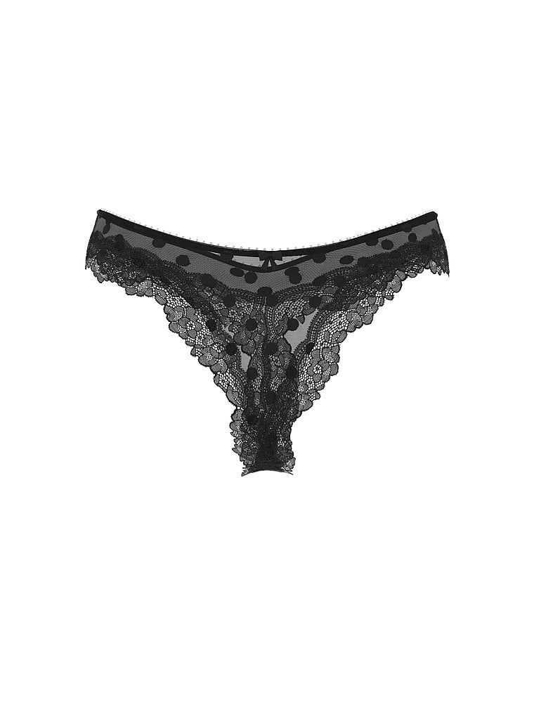 Tanga Tease Sheer Dot din plasă înaltă cu picioare înalte. Produsul este modelat și provine din colecția Victoria's Secret.