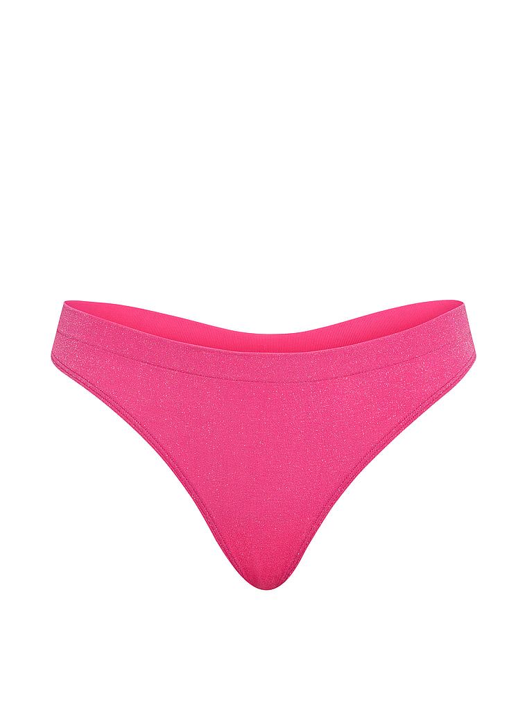 Tanga din material strălucitor de Shimmer. Produsul este roz și provine din colecția Seamless (Seamless Collection).