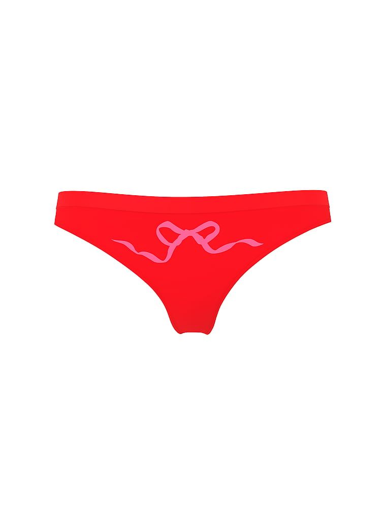 Tanga cu arc fără sudură. Produsul este de culoare roșie și provine din colecția Seamless
