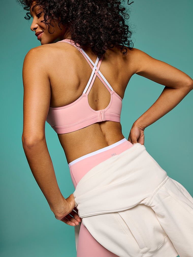 VSX Angel Elevate sutien sport. Produsul este roz și provine din colecția VSX.