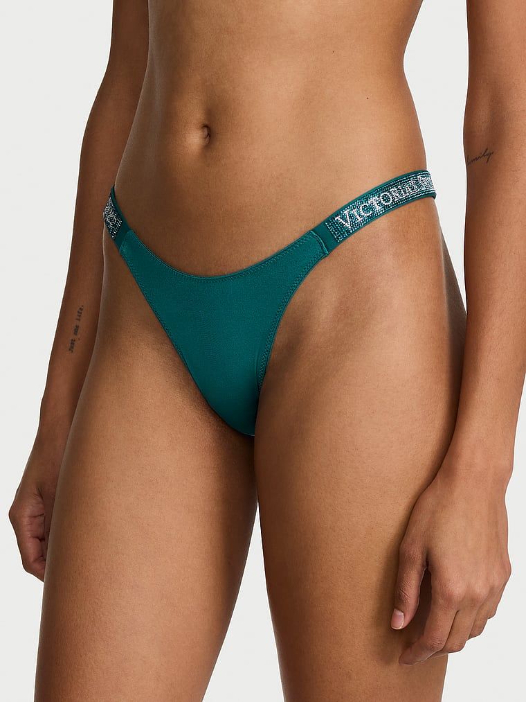 Chiloți brazilieni cu dungi braziliene Shine Strap. Produsul este de culoare albastră și provine din colecția Very Sexy.