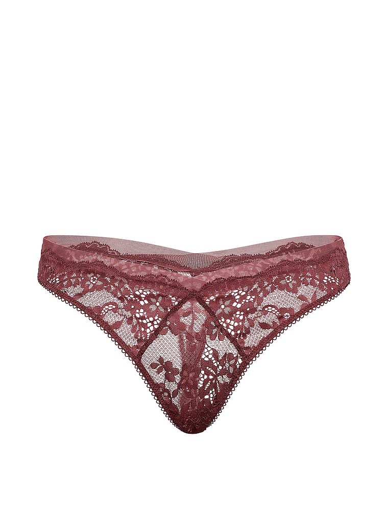 Tanga din dantelă și plasă. Produsul este roz și provine din colecția Dream Angels.