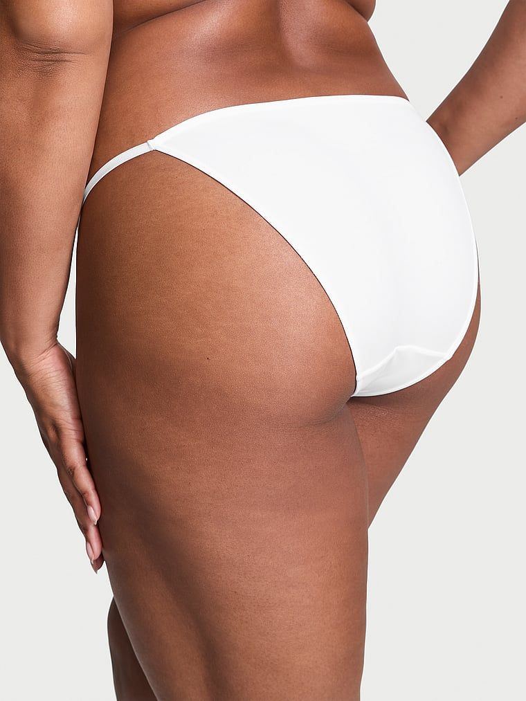 Chiloți cu bretele reglabile pentru bikini. Produsul este alb și provine din colecția Dream Angels.
