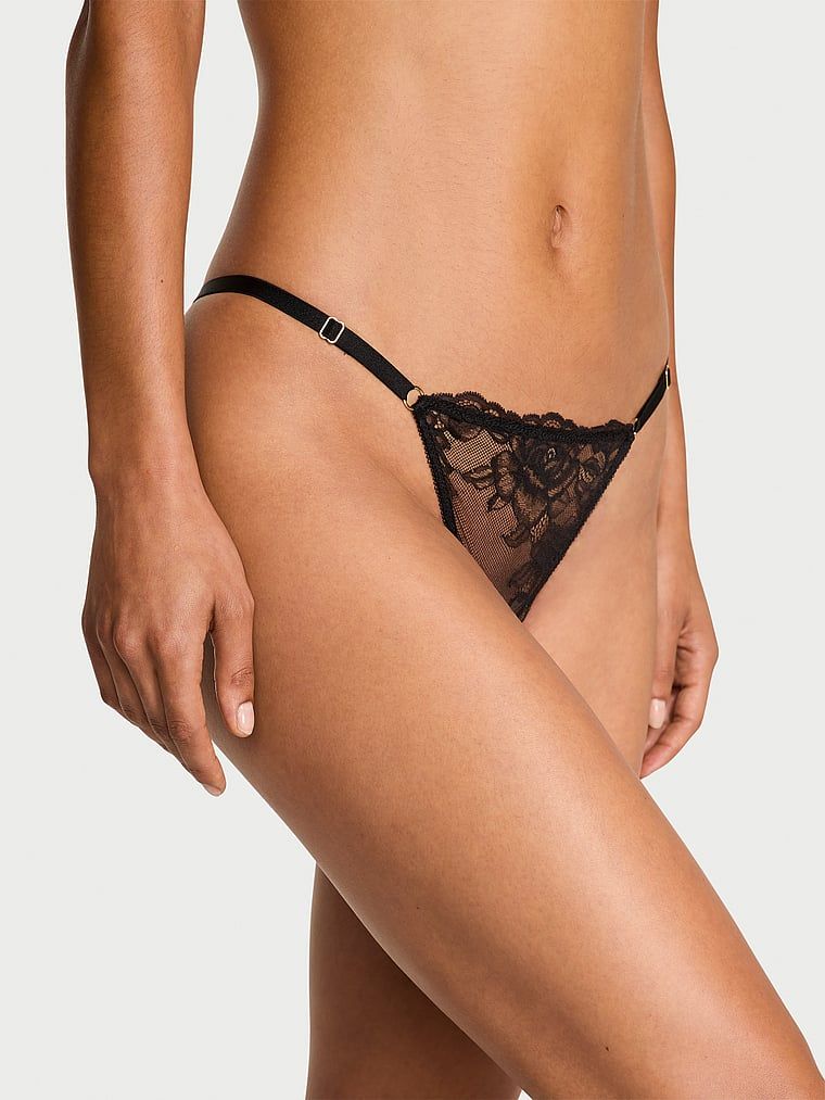 Tanga din dantelă cu bretele reglabile Rose Lace V-String. Produsul este negru și provine din colecția Body by Victoria.