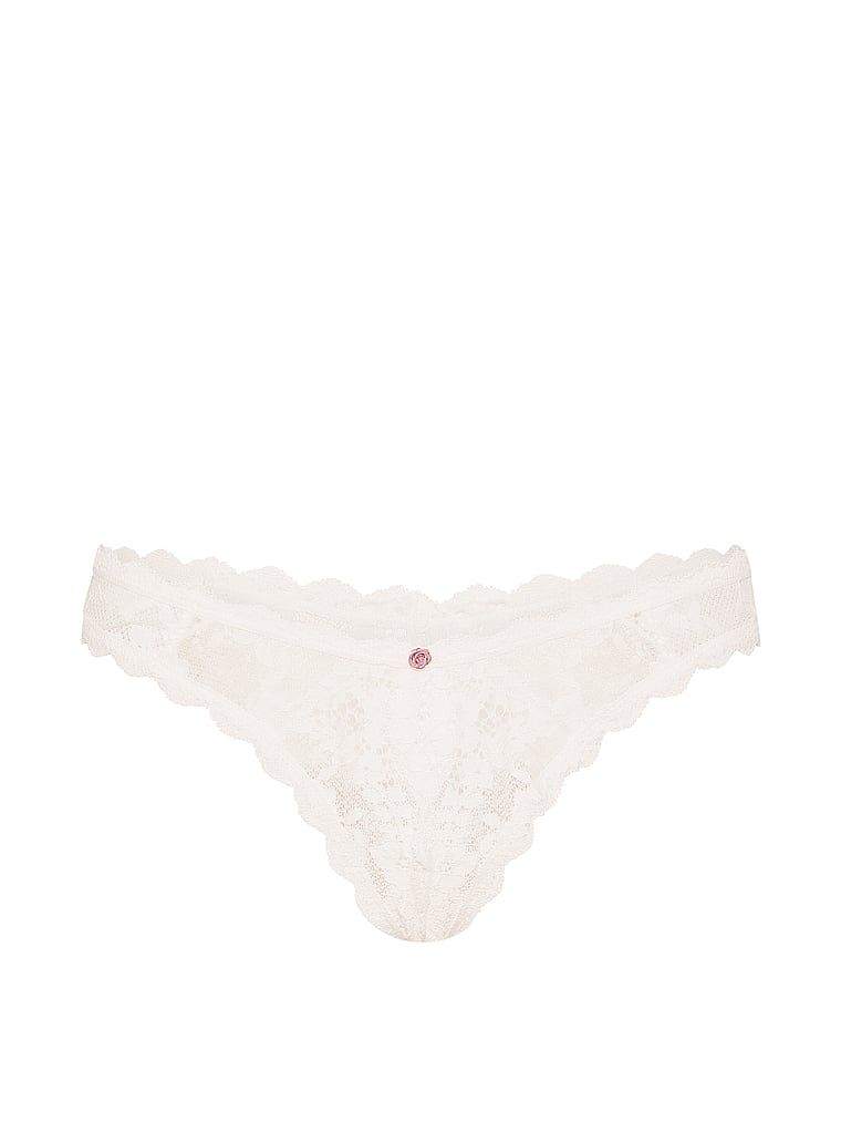 Pantaloni brazilieni din dantelă pentru zona inghinală a lui Peekaboo. Produsul este alb și provine din colecția Dream Angels.