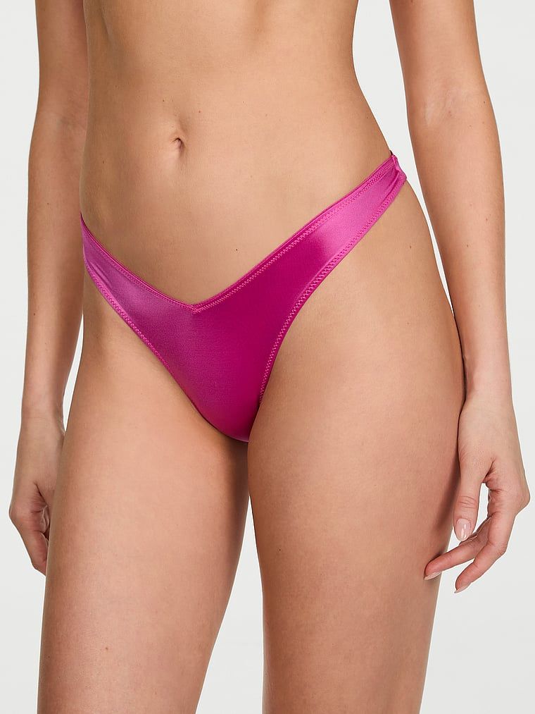 Tanga cu bretele la spate și picior înalt cu strappy-back. Produsul este roz și provine din colecția Very Sexy.