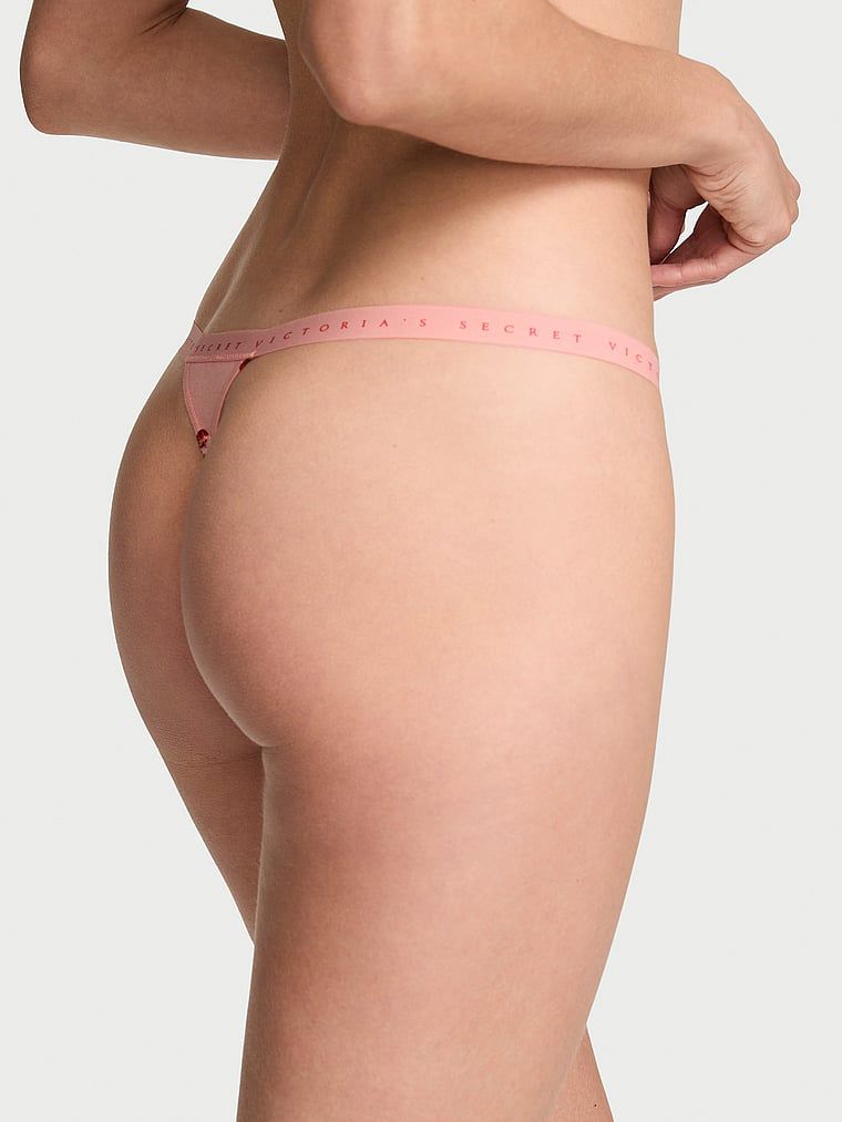 Tanga de bumbac elastic. Produsul are o culoare cu model și provine din colecția Victoria's Secret.