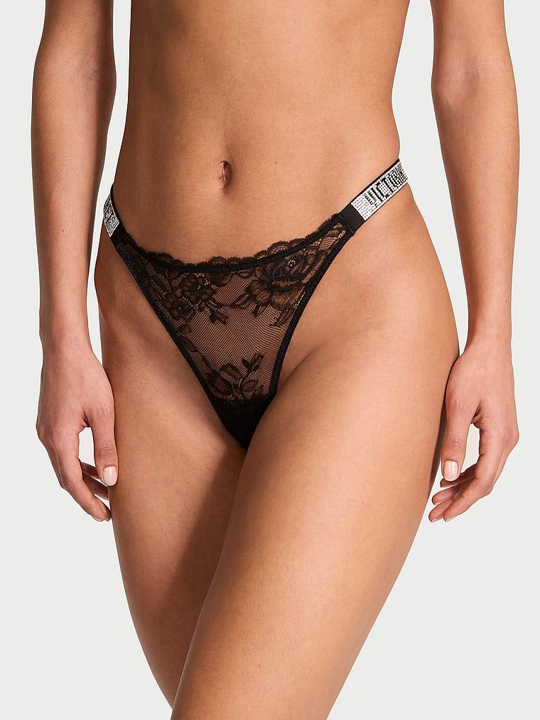Chiloți brazilieni din dantelă Shine Strap cu bretele strălucitoare. Produsul este negru și provine din colecția Very Sexy.