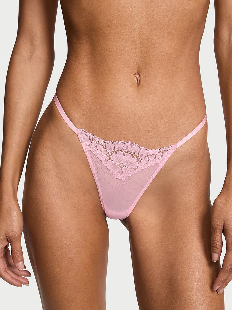 Tanga Crystal Heartware cu o inimă sclipitoare în spate. Produsul este roz și provine din colecția Dream Angels.