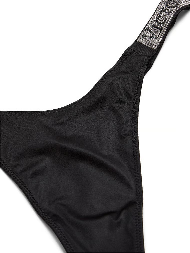 Tanga cu curele strălucitoare Shine Trap. Produsul este negru și provine din colecția Very Sexy.